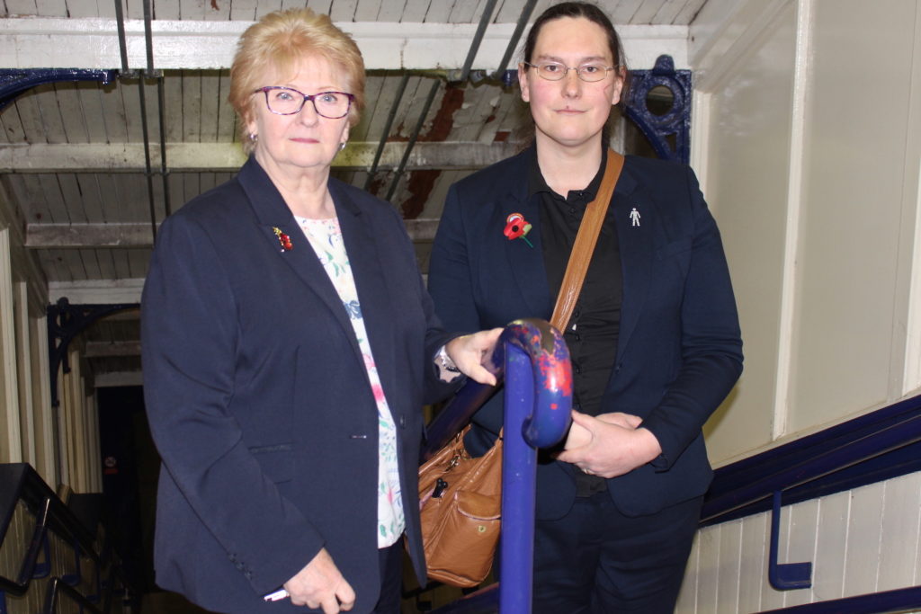 Cllrs Christine Wild and Zoë Kirk-Robinson stood on the stairs leading down to the platforms at Daisy Hill Station, November 2018